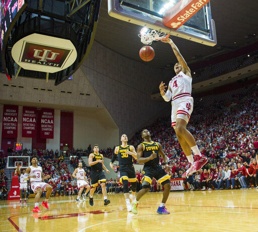 Indiana uses 3-point flurry to beat No. 21 Iowa, end skid